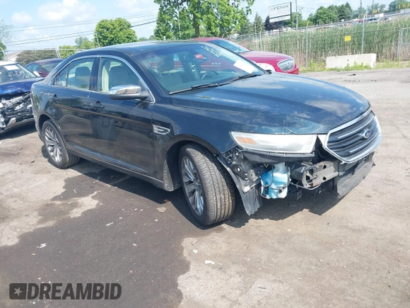 2014 Ford Taurus Limited z VIN 1FAHP2F85EG125118, wystawiony jako IAAI lot #42457437 z przebiegiem 129 406 mil mil oraz . Historia ofert i sprzedaży dostępna na DreamBid. Obrazek 1.