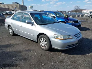 2002 Honda Accord Sdn SE with VIN 1HGCG66852A075252, listed as a IAAI auction lot 41877951 with 64,929 mi miles. Bid and sale history available at carsss.com. Image 1.