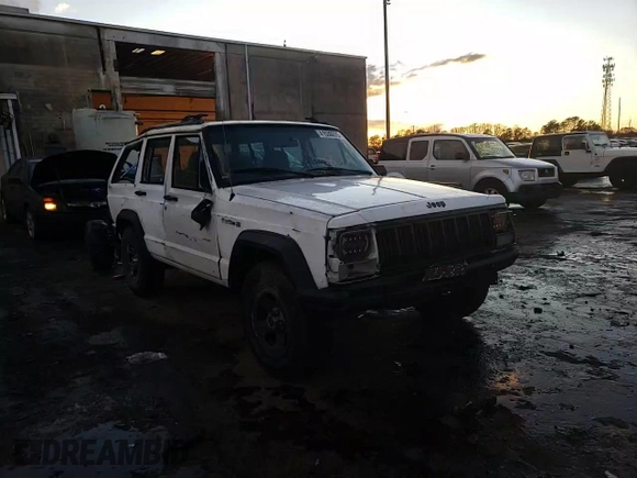 1995 Jeep Cherokee SE с VIN 1J4FT28S1SL634660, выставлен на аукционе Copart как лот 41530075 с пробегом Не указан миль и Списание • Salvage title. История ставок и продаж доступна на DreamBid. Изображение 11.