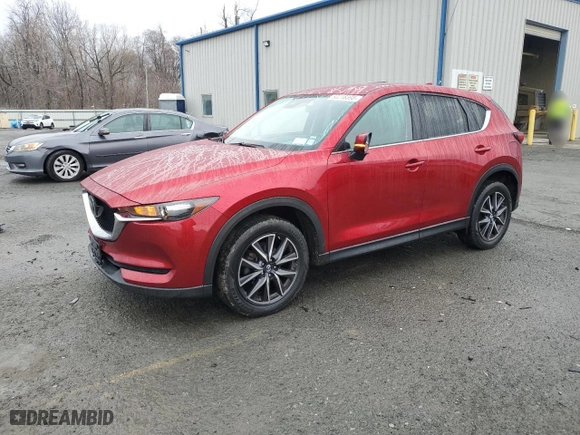 2018 Mazda CX-5 Touring with VIN JM3KFBCM7J0410112, listed as a Copart auction lot 50218395 with 94,752 mi miles and Salvage Title. Bid and sale history available at carsss.com. Image 1.
