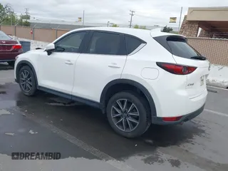 2018 Mazda CX-5 Grand Touring with VIN JM3KFADM1J0309995, listed as a IAAI auction lot 41977003 with 75,303 mi miles. Bid and sale history available at carsss.com. Image 3.