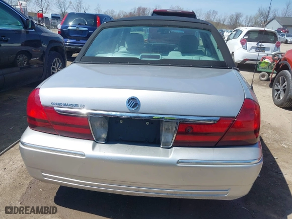 2005 Mercury Grand Marquis LS Premium with VIN 2MEFM75WX5X663507, listed as a IAAI auction lot 42046613 with 85,358 mi miles. Bid and sale history available at carsss.com. Image 16.