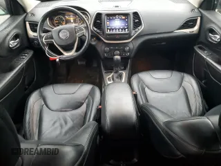 2014 Jeep Cherokee Limited с VIN 1C4PJLDB7EW258447, выставлен на аукционе Copart как лот 57681125 с пробегом 80 818 миль миль и Списание • Salvage title. История ставок и продаж доступна на DreamBid. Изображение 8.