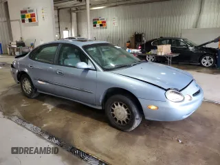 1997 Ford Taurus LX with VIN 1FALP53S8VA114239, listed as a Copart auction lot 56534025 with 110,834 mi miles and Salvage title. Bid and sale history available at DreamBid. Image 4.