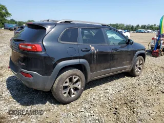 2015 Jeep Cherokee Trailhawk with VIN 1C4PJMBS6FW785891, listed as a Copart auction lot 61040565 with 156,421 mi miles and Clean title. Bid and sale history available at DreamBid. Image 3.