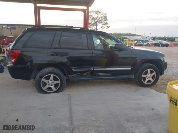 2005 Jeep Grand Cherokee Laredo with VIN 1J4HR48N75C647740, listed as a IAAI auction lot 41803160 with 145,147 mi miles. Bid and sale history available at carsss.com. Image 13.