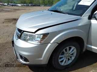2013 Dodge Journey SXT z VIN 3C4PDCBG4DT564290, wystawiony jako IAAI lot #42225485 z przebiegiem 69 029 mil mil oraz . Historia ofert i sprzedaży dostępna na DreamBid. Obrazek 17.