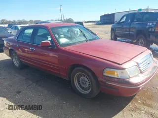 2001 Ford Crown Victoria LX z VIN 2FAFP74W11X206742, wystawiony jako IAAI lot #41310064 z przebiegiem 173 974 mil mil oraz . Historia ofert i sprzedaży dostępna na DreamBid. Obrazek 1.