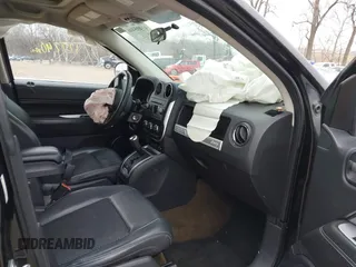 2014 Jeep Compass Latitude with VIN 1C4NJCEA8ED550147, listed as a IAAI auction lot 41405446 with 127,240 mi miles. Bid and sale history available at carsss.com. Image 5.