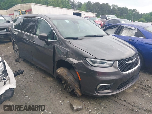 2023 Chrysler Pacifica Hybrid Touring L with VIN 2C4RC1L72PR540902, listed as a IAAI auction lot 42151047 with Not Provided miles and . Bid and sale history available at DreamBid. Image 1.