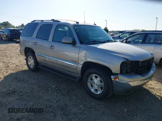 2004 GMC Yukon SLT with VIN 1GKEC13Z74R108649, listed as a IAAI auction lot 42054405 with 398,691 mi miles. Bid and sale history available at carsss.com. Image 1.