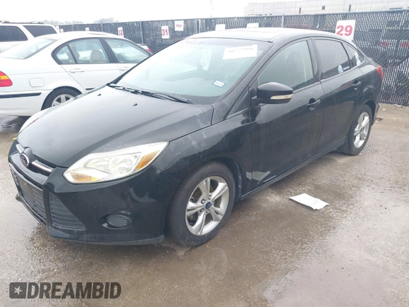 2013 Ford Focus SE with VIN 1FADP3F22DL308840, listed as a IAAI auction lot 42727900 with 112,694 mi miles and . Bid and sale history available at DreamBid. Image 2.