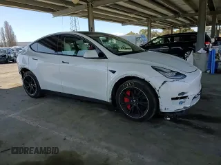 2021 Tesla Model Y Long Range z VIN 5YJYGDEE7MF228787, wystawiony jako Copart lot #47252275 z przebiegiem 59 823 mil mil oraz Szkoda całkowita • Salvage title. Historia ofert i sprzedaży dostępna na DreamBid. Obrazek 11.