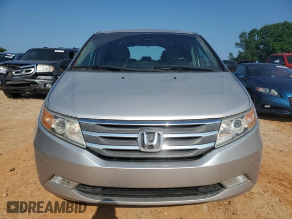 2012 Honda Odyssey Touring с VIN 5FNRL5H93CB137468, выставлен на аукционе Copart как лот 59330545 с пробегом 105 880 миль миль и Списание • Salvage title. История ставок и продаж доступна на DreamBid. Изображение 5.