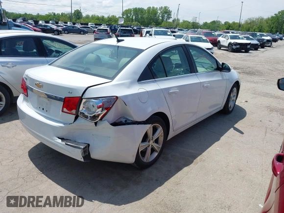 2014 Chevrolet Cruze 2LT z VIN 1G1PE5SBXE7168795, wystawiony jako IAAI lot #42285484 z przebiegiem 104 317 mil mil oraz . Historia ofert i sprzedaży dostępna na DreamBid. Obrazek 4.