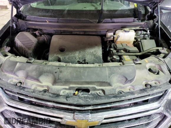 2021 Chevrolet Traverse Premier z VIN 1GNEVKKW9MJ174323, wystawiony jako Copart lot #45936545 z przebiegiem 54 049 mil mil oraz Nie do naprawy • Non repairable. Historia ofert i sprzedaży dostępna na DreamBid. Obrazek 12.