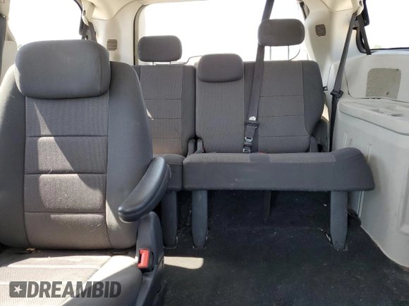 2008 Dodge Grand Caravan SE z VIN 2D8HN44H58R146828, wystawiony jako Copart lot #57417075 z przebiegiem 186 657 mil mil oraz Nie do naprawy • Non repairable. Historia ofert i sprzedaży dostępna na DreamBid. Obrazek 10.