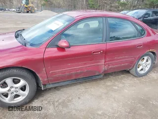 2003 Ford Taurus SE Standard with VIN 1FAFP53UX3G108418, listed as a IAAI auction lot 42042047 with 194,683 mi miles. Bid and sale history available at carsss.com. Image 6.