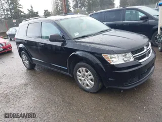 2018 Dodge Journey SE with VIN 3C4PDCAB6JT429877, listed as a IAAI auction lot 41847072 with 111,865 mi miles. Bid and sale history available at carsss.com. Image 1.