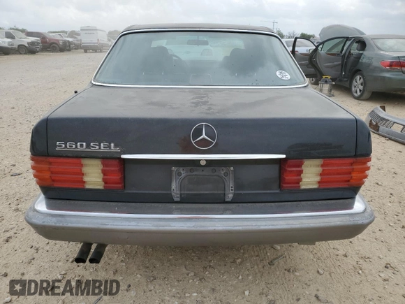 1987 Mercedes-Benz 560 with VIN WDBCA39DXHA343601, listed as a Copart auction lot 53922265 with 263,600 mi miles and Clean Title. Bid and sale history available at DreamBid. Image 6.