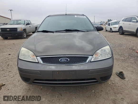 2007 Ford Focus S with VIN 1FAFP31N87W226088, listed as a Copart auction lot 88584555 with 83,896 mi miles and Salvage Title. Bid and sale history available at DreamBid. Image 5.
