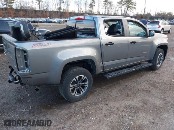 2021 Chevrolet Colorado 4WD Z71 with VIN 1GCGTDEN0M1289754, listed as a IAAI auction lot 41837440 with 30,923 mi miles and . Bid and sale history available at DreamBid. Image 4.