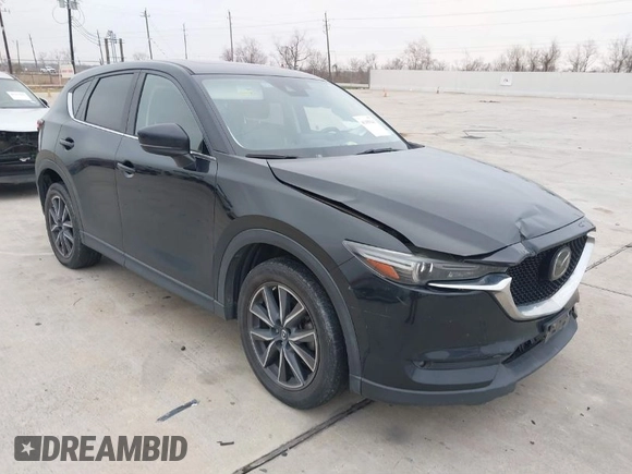 2017 Mazda CX-5 Grand Touring with VIN JM3KFADL9H0110985, listed as a IAAI auction lot 41435143 with 88,208 mi miles. Bid and sale history available at carsss.com. Image 1.