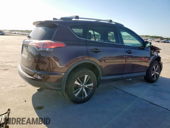 2018 Toyota RAV4 XLE with VIN 2T3WFREVXJW457073, listed as a Copart auction lot 62339635 with 75,321 mi miles and Salvage title. Bid and sale history available at DreamBid. Image 3.