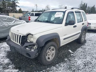 2004 Jeep Liberty Sport with VIN 1J4GL48K14W115867, listed as a IAAI auction lot 41482160 with 179,090 mi miles. Bid and sale history available at carsss.com. Image 17.