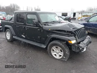 2022 Jeep Gladiator Texas Trail with VIN 1C6HJTAG1NL102451, listed as a IAAI auction lot 40969999 with 69,797 mi miles. Bid and sale history available at carsss.com. Image 1.