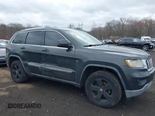 2011 Jeep Grand Cherokee Laredo with VIN 1J4RR4GGXBC597743, listed as a IAAI auction lot 41897286 with 253,111 mi miles and . Bid and sale history available at DreamBid. Image 17.