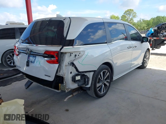 2021 Honda Odyssey Touring z VIN 5FNRL6H80MB003323, wystawiony jako IAAI lot #42303968 z przebiegiem 51 531 mil mil oraz . Historia ofert i sprzedaży dostępna na DreamBid. Obrazek 4.