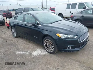 2014 Ford Fusion Titanium Hybrid with VIN 3FA6P0RU5ER108753, listed as a IAAI auction lot 42255107 with 154,662 mi miles and . Bid and sale history available at DreamBid. Image 1.