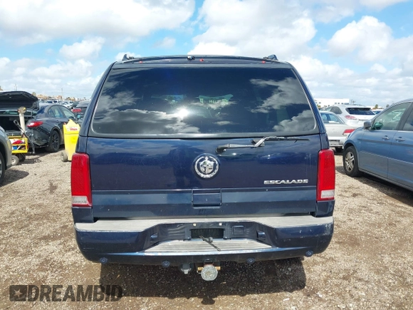 2004 Cadillac Escalade z VIN 1GYEC63T34R273497, wystawiony jako IAAI lot #41719537 z przebiegiem 256 975 mil mil oraz . Historia ofert i sprzedaży dostępna na DreamBid. Obrazek 16.