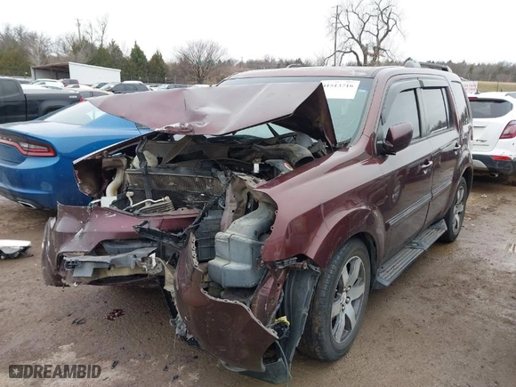 2013 Honda Pilot Touring with VIN 5FNYF4H92DB014906, listed as a IAAI auction lot 41513716 with 209,436 mi miles. Bid and sale history available at carsss.com. Image 2.