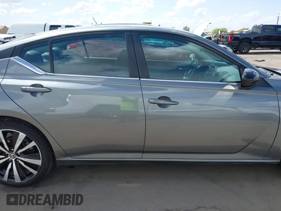 2021 Nissan Altima 2.5 SR with VIN 1N4BL4CV5MN305099, listed as a IAAI auction lot 41669894 with 97,251 mi miles. Bid and sale history available at carsss.com. Image 14.