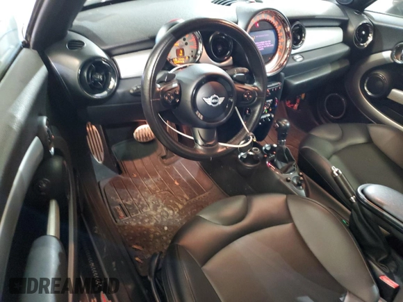 2012 MINI Coupe S z VIN WMWSX3C50CT154835, wystawiony jako Copart lot #76659984 z przebiegiem 122 425 mil mil oraz Szkoda całkowita • Salvage title. Historia ofert i sprzedaży dostępna na DreamBid. Obrazek 8.
