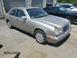 1999 Mercedes-Benz E-Class with VIN WDBJF65H2XA796208, listed as a Copart auction lot 62738904 with 156,283 mi miles and Salvage Title. Bid and sale history available at carsss.com. Image 4.