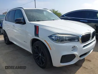 2014 BMW X5 sDrive35i z VIN 5UXKR2C55E0C00026, wystawiony jako IAAI lot #42098981 z przebiegiem 115 274 mil mil oraz . Historia ofert i sprzedaży dostępna na DreamBid. Obrazek 1.