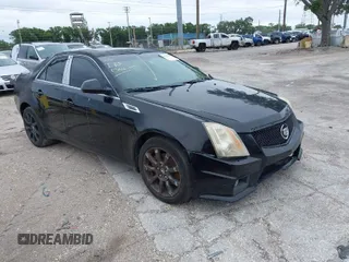 2008 Cadillac CTS RWD w/1SB with VIN 1G6DP57V880204877, listed as a IAAI auction lot 41654282 with 165,948 mi miles. Bid and sale history available at carsss.com. Image 1.
