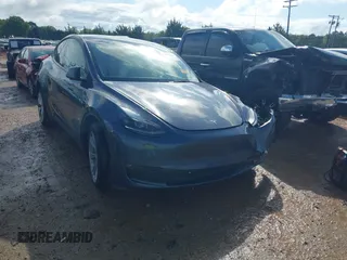 2023 Tesla Model Y Long Range with VIN 7SAYGDEE2PF674286, listed as a IAAI auction lot 42010275 with Not Provided miles and . Bid and sale history available at carsss.com. Image 1.