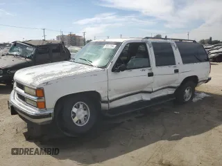 1997 Chevrolet Suburban with VIN 1GNEC16R5VJ301591, listed as a Copart auction lot 75965054 with 213,321 mi miles and Salvage Title. Bid and sale history available at carsss.com. Image 1.