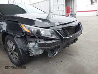 2014 Kia Optima LX with VIN 5XXGM4A7XEG280084, listed as a IAAI auction lot 42063263 with 168,052 mi miles. Bid and sale history available at carsss.com. Image 6.