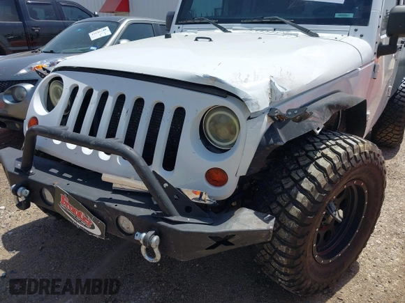 2013 Jeep Wrangler Unlimited Sport with VIN 1C4BJWDGXDL694054, listed as a IAAI auction lot 42097708 with 130,360 mi miles and . Bid and sale history available at DreamBid. Image 6.