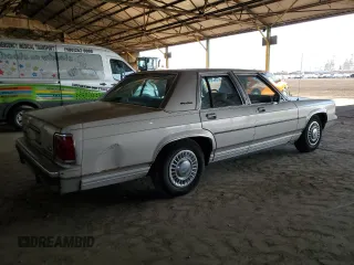 1990 Ford Crown Victoria z VIN 2FACP73F9LX166174, wystawiony jako Copart lot #76043234 z przebiegiem 52 545 mil mil oraz Szkoda całkowita • Salvage title. Historia ofert i sprzedaży dostępna na DreamBid. Obrazek 3.