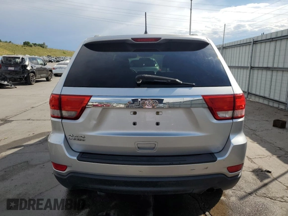 2011 Jeep Grand Cherokee Laredo with VIN 1J4RR4GG1BC576277, listed as a Copart auction lot 63220925 with 149,573 mi miles and Salvage title. Bid and sale history available at DreamBid. Image 6.