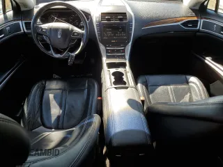 2016 Lincoln MKZ z VIN 3LN6L2G90GR600752, wystawiony jako Copart lot #56599625 z przebiegiem 73 275 mil mil oraz Szkoda całkowita • Salvage title. Historia ofert i sprzedaży dostępna na DreamBid. Obrazek 8.