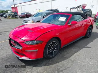 2022 Ford Mustang EcoBoost z VIN 1FATP8UH2N5124679, wystawiony jako IAAI lot #42271957 z przebiegiem 44 470 mil mil oraz . Historia ofert i sprzedaży dostępna na DreamBid. Obrazek 18.