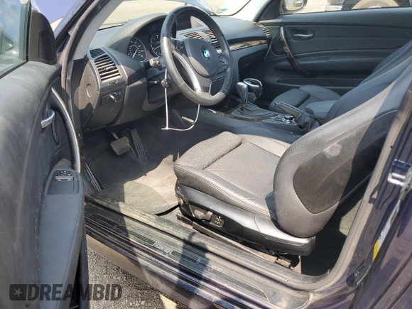 2011 BMW 1 Series 128i with VIN WBAUP7C57BVP21318, listed as a Copart auction lot 60479055 with 102,151 mi miles and Salvage title. Bid and sale history available at DreamBid. Image 8.