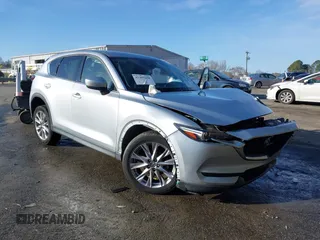 2020 Mazda CX-5 Grand Touring with VIN JM3KFADM0L0738337, listed as a IAAI auction lot 41485078 with Not provided miles and . Bid and sale history available at DreamBid. Image 1.